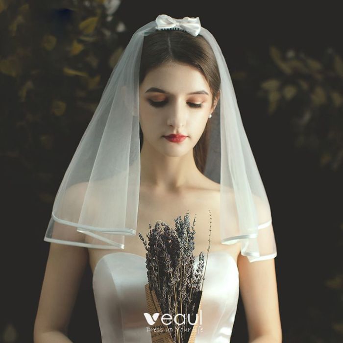 A line wedding dress with veil